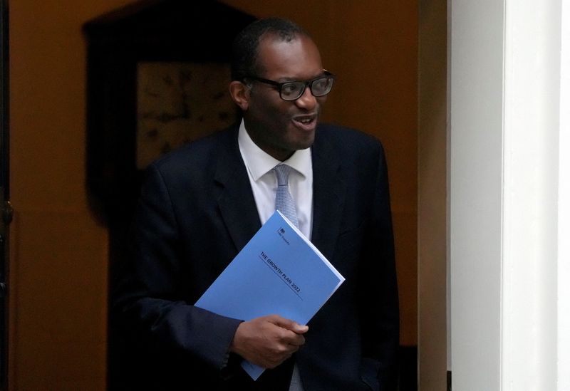 UK's Kwarteng to scrap top rate of income tax, cut basic rate from April