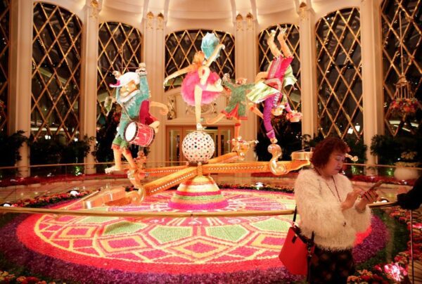 Macau casino operators soar as China allows tour groups after nearly 3 years