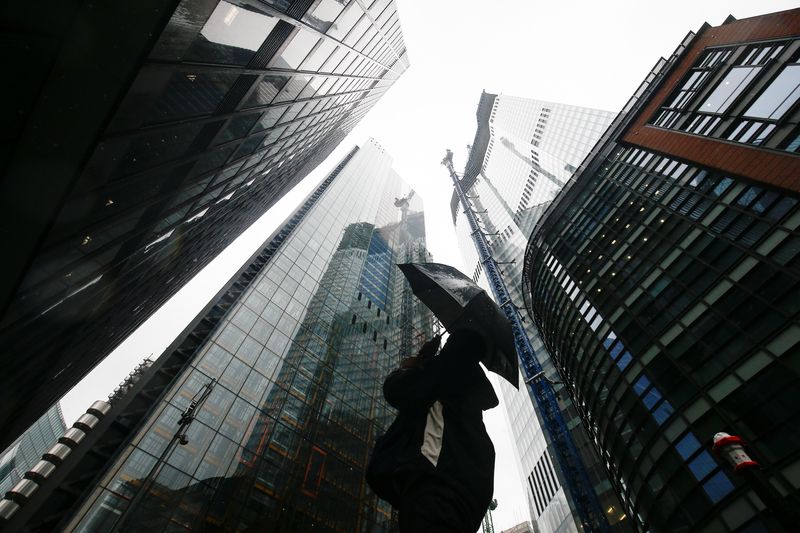 Factbox-Companies cut jobs, freeze hiring to prepare for economic slowdown