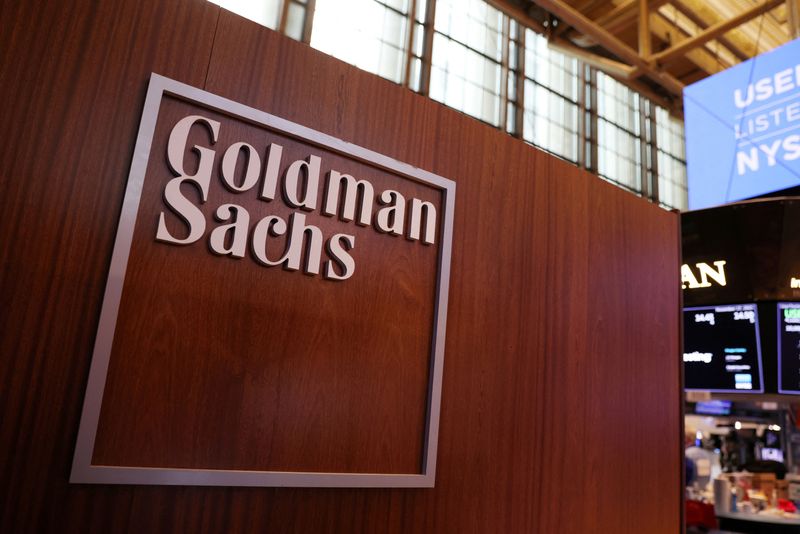 Goldman Sachs unveils revamp as profit shrinks