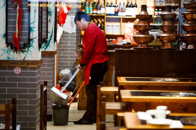 China's services sector activity falls - official PMI
