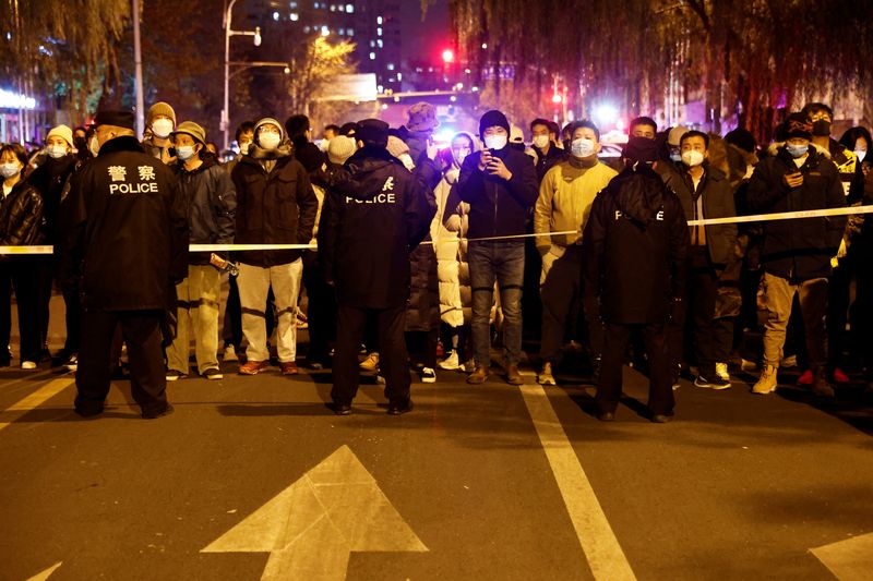 Investors hope Beijing will lift COVID curbs faster as protests rattle markets