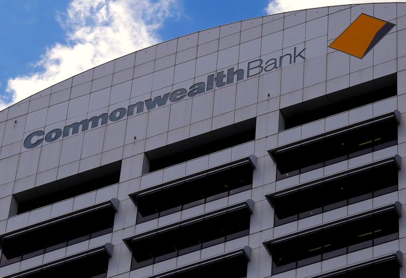 Australia's Big Four banks pass central bank rate hike to home loan customers