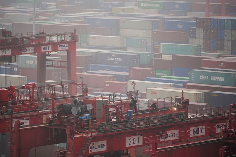 China's trade suffers worst slump in 2-1/2 years as COVID woes, feeble demand take toll