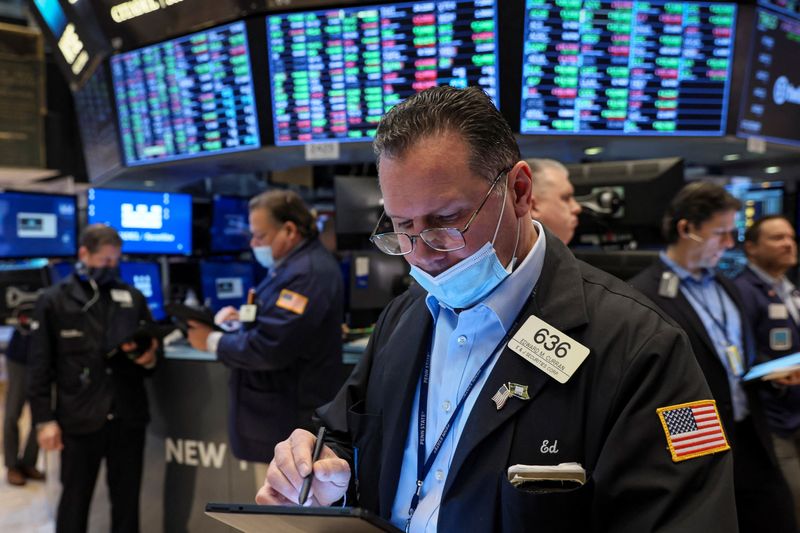 Wall Street slumps in broad swoon to end bumpy week