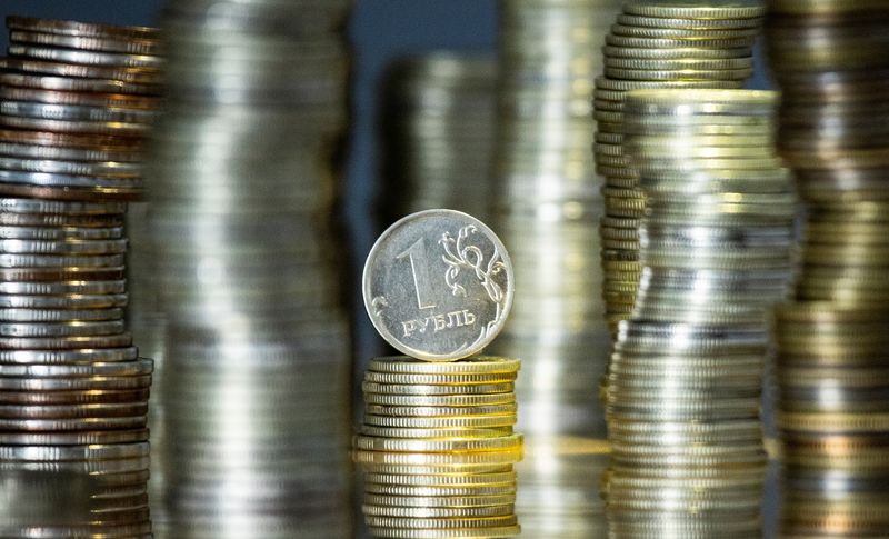 Russian rouble rises in low volumes, market eyes coupon payments
