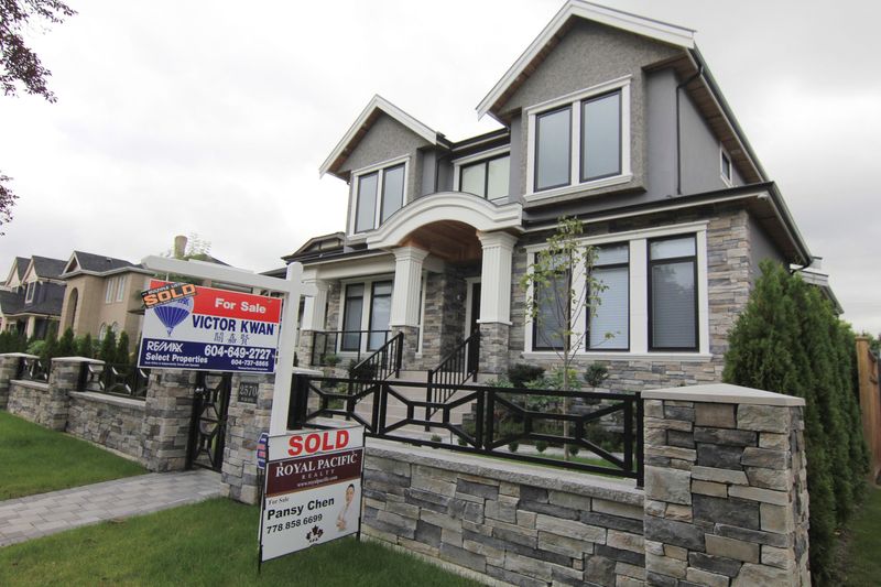 Canada's red-hot housing markets hint at cooldown as higher rates, inflation bite