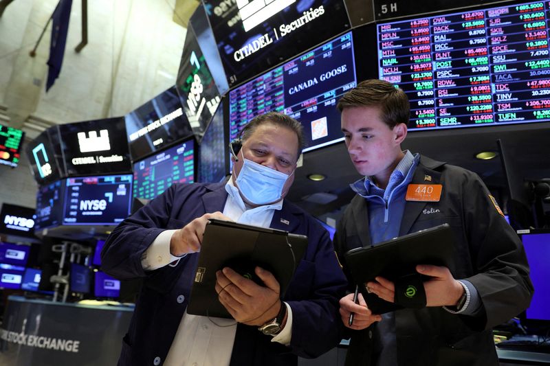 S&P 500 climbs for third straight day as Tesla leads