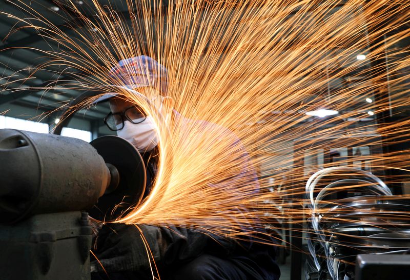 Chinese manufacturing, services contract together for first time since 2020