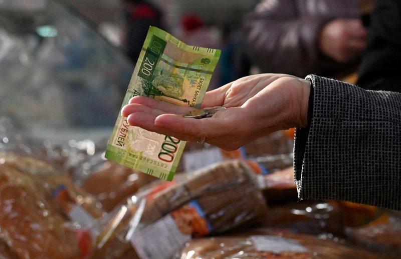 Russian rouble firms vs dollar, OFZ bonds near 2-month highs