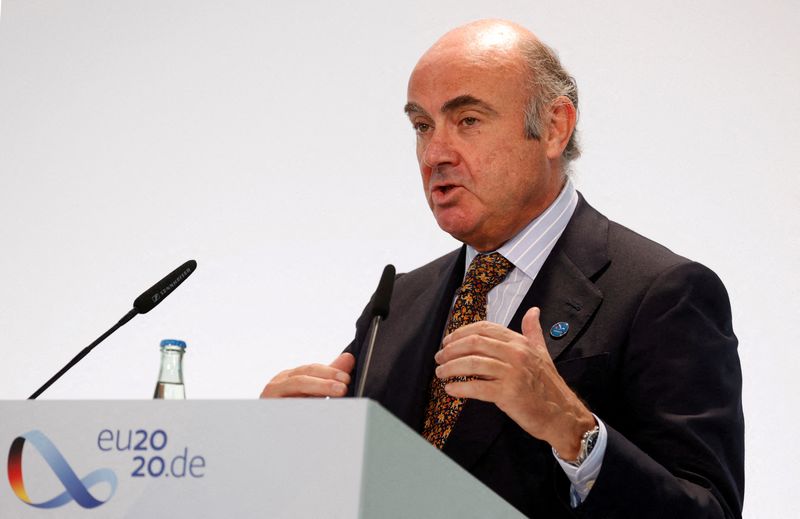 ECB's de Guindos backs ending bond purchases in July