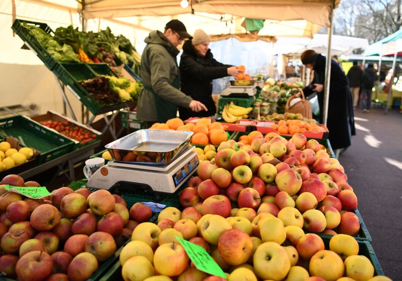 Euro zone March inflation revised slightly down, still at record