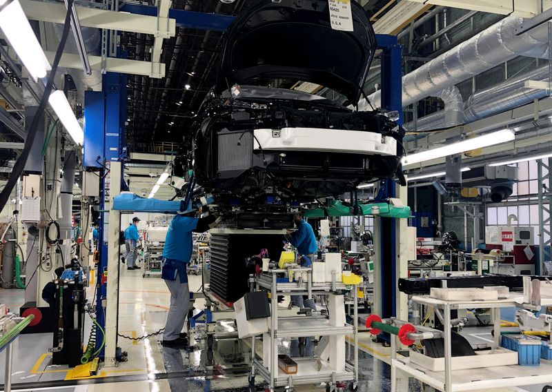 Toyota reports record high global production for March, despite slump at home