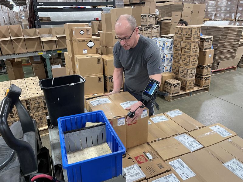 Amazon's net loss prompts query: Has it built too many warehouses?