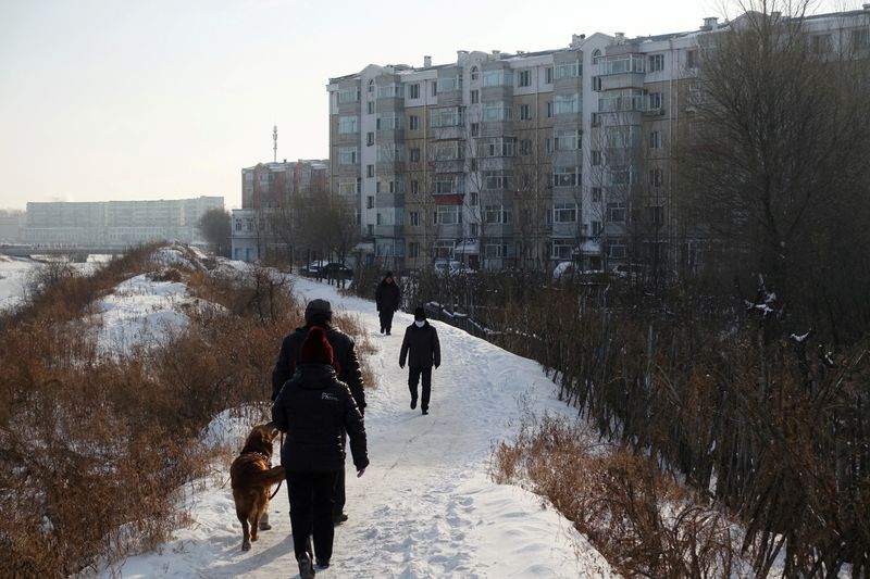 China property market slumps on developers' debt crisis, weak buyer sentiment