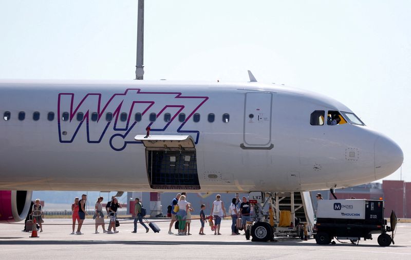 Wizz Air sees strong summer, but more wary than rivals