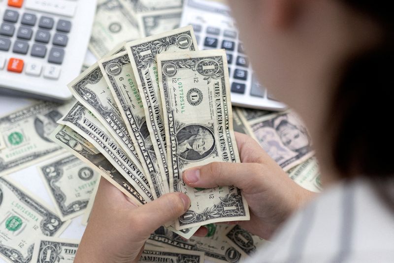 Dollar falls as markets consolidate gains; up vs yen ahead of inflation data