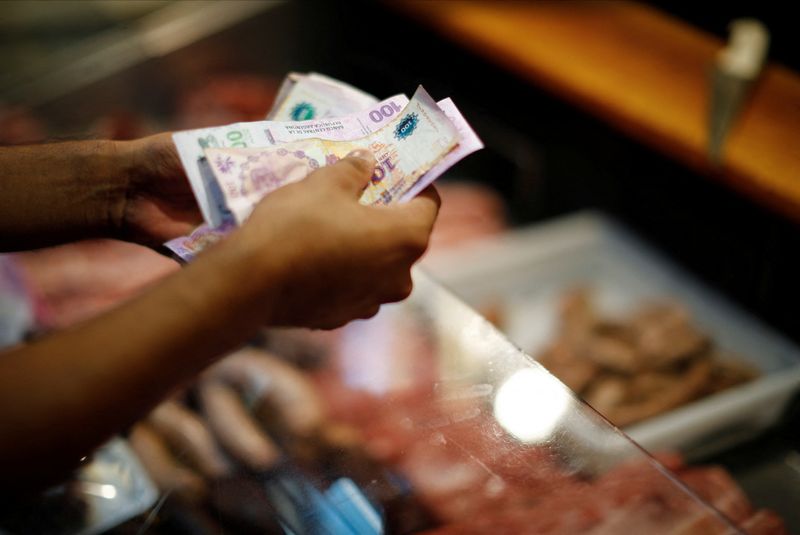 Argentina orders public sector to give up dollar bonds in debt shake-up
