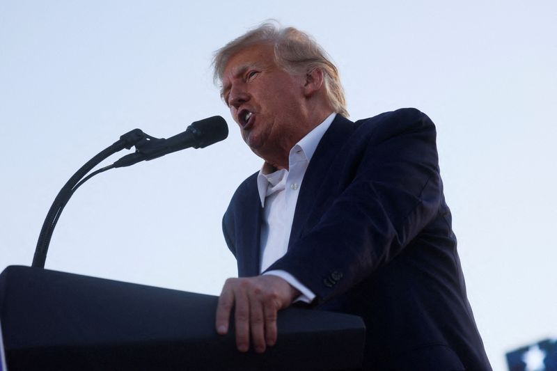 Trump faces more than 30 counts over business fraud in indictment -CNN