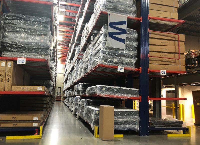 US business inventories rise moderately in February