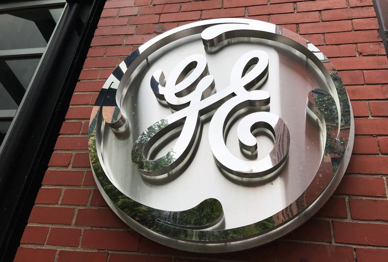 GE raises profit outlook even as economic risks mount