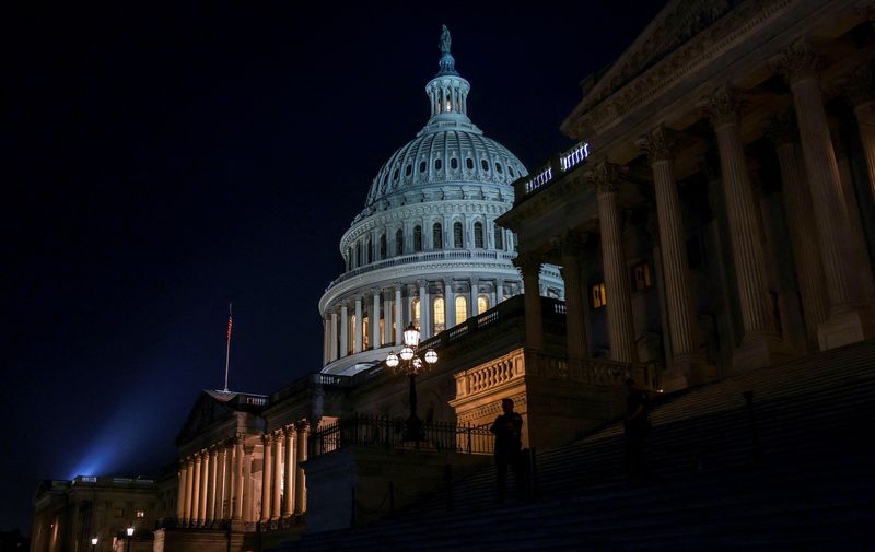 US Congress averts historic default, approves debt-limit suspension