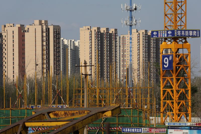 China's slower home price growth, deepening investment slump signal more easing