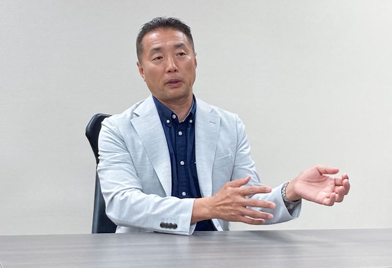 Panasonic needs four more EV battery plants, executive says