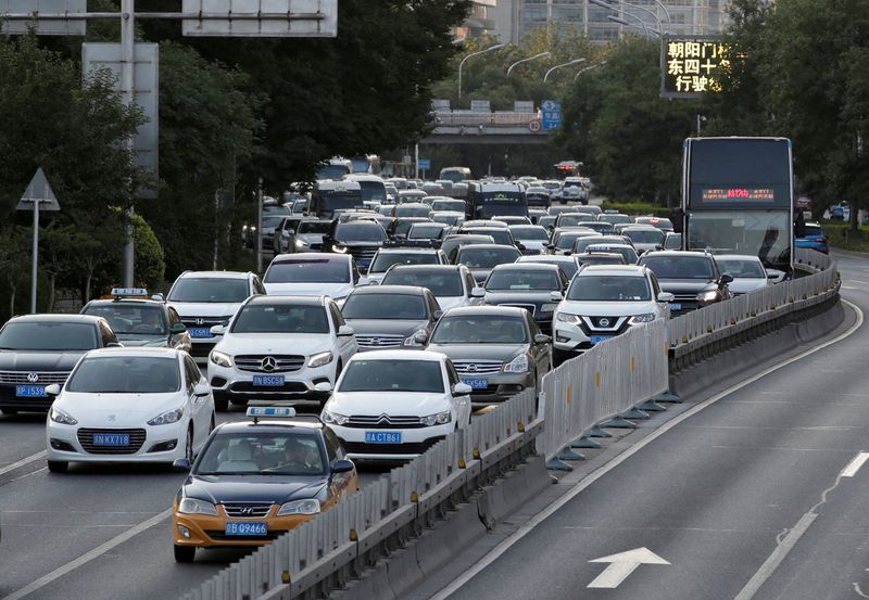 China's auto group retracts pledge to avoid 'abnormal pricing'