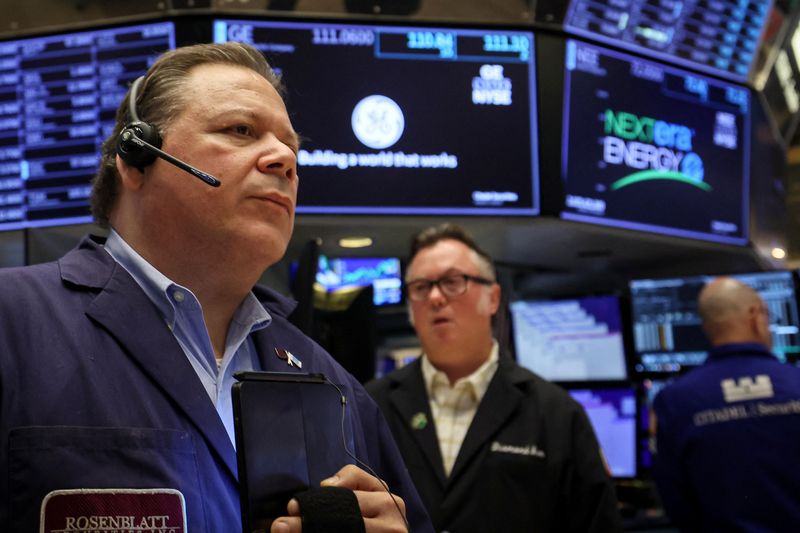 Wall Street closes near flat as Treasury yields surge