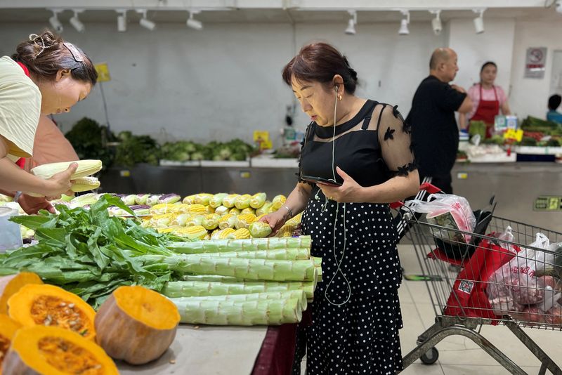 China stats bureau sees no deflation risks, plays down property woes