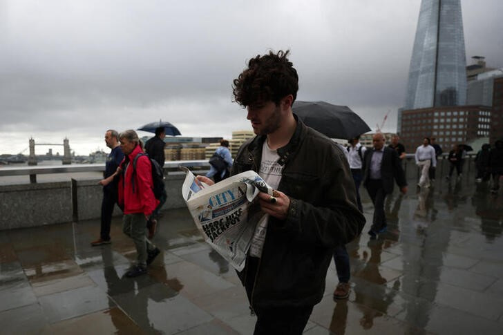 UK basic wage growth hits record, adding to Bank of England's worries
