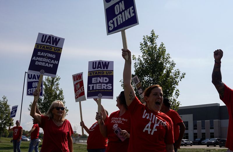 UAW strikes more GM, Stellantis facilities, cites progress in talks with Ford