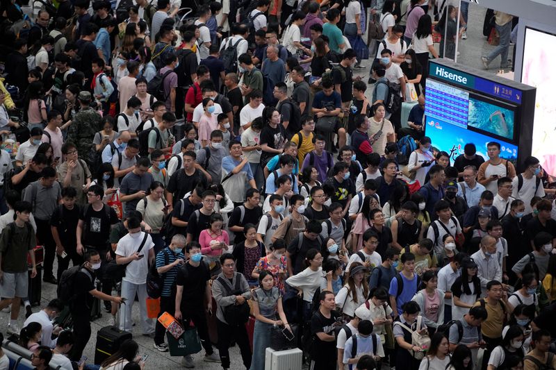 Holidays at home for record number of Chinese as economic slowdown bites