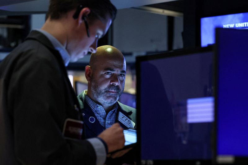Wall St ends lower on Powell remarks as benchmark Treasury yields near 5%