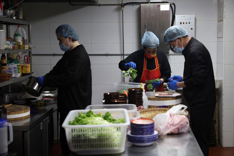 China's services activity picks up slightly in Oct - Caixin PMI
