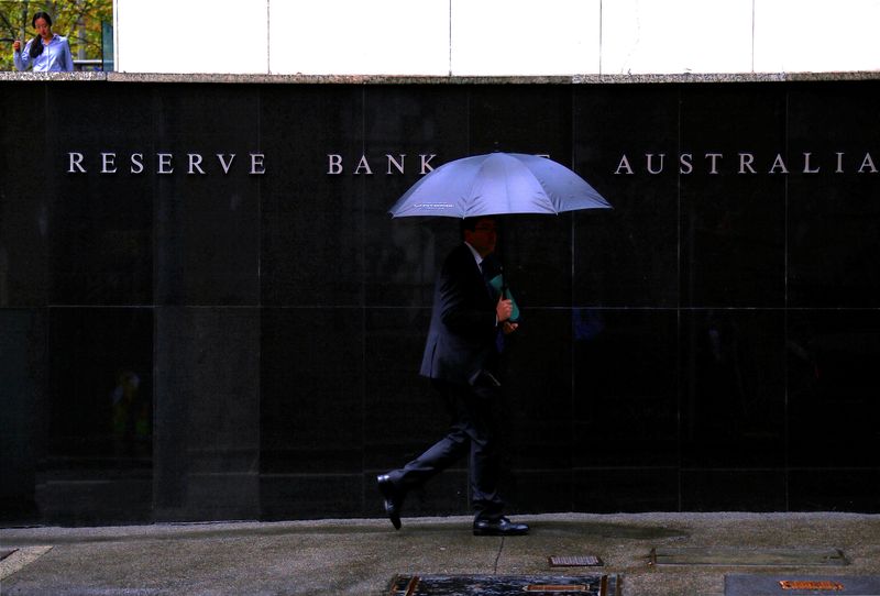 Australia's central bank raises rates to 12-year high, tempers hawkish stance