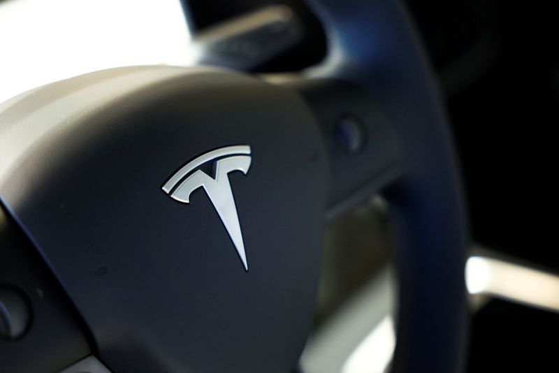 Tesla ready to invest up to $2 billion to build India factory, but with riders -ET