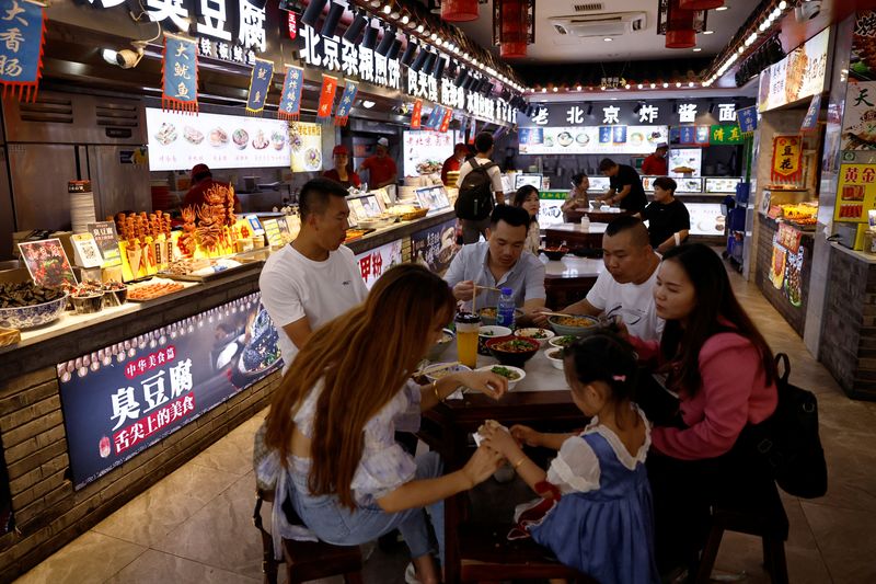 China's Nov services activity accelerates on boost from new orders - Caixin PMI