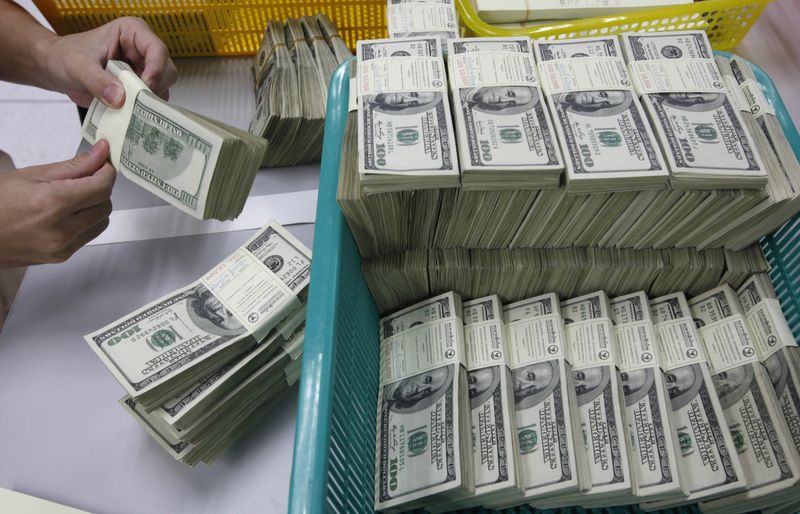 Dollar hits 5-mth low against euro as Fed seen closer to rate cuts
