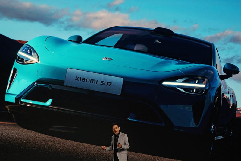China's Xiaomi unveils first electric car, plans to become top automaker