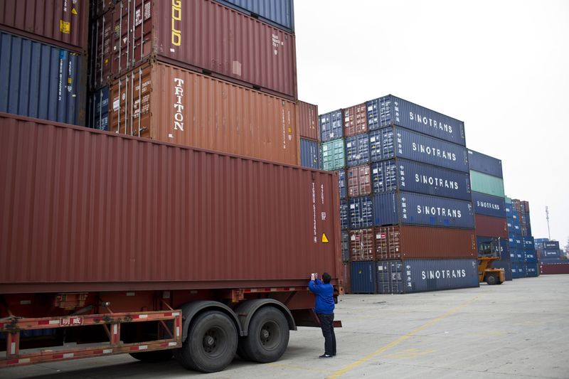 China's exports seen improving in December as global trade picks up