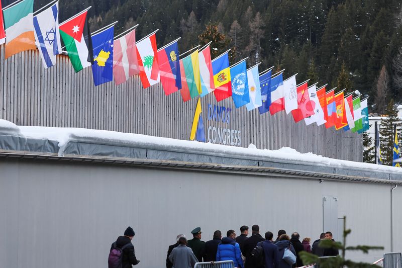 Bank CEOs, huddled in private in Davos, worry about competition, economy - sources