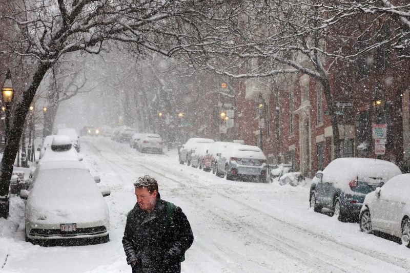 Winter storm grips U.S. Northeast with mix of heavy snow, freezing rain