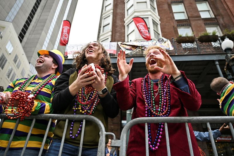 'Emerging from a darkness': Mardi Gras revelers shed pandemic woes