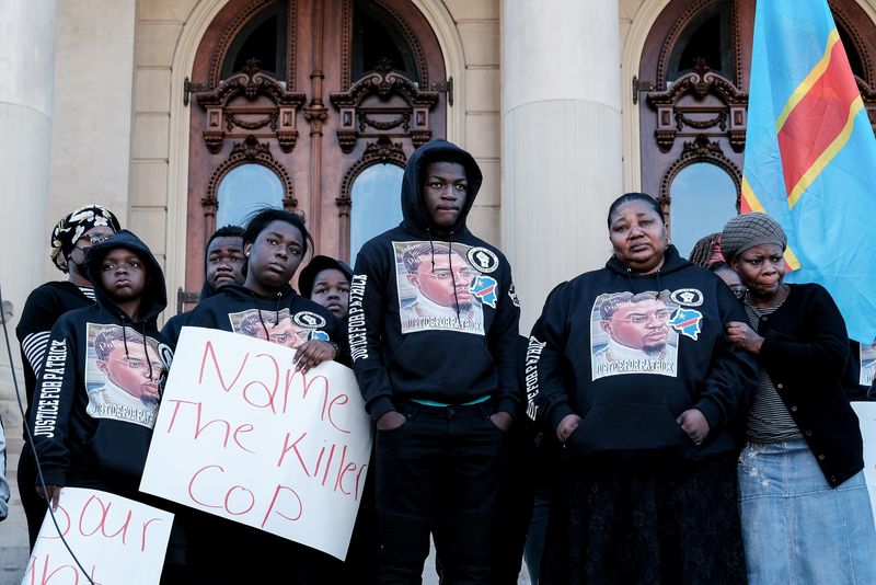 White Michigan officer pleads not guilty to African refugee's murder