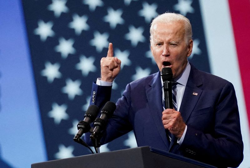 Biden assails Trump loyalists but not all Republicans after backlash