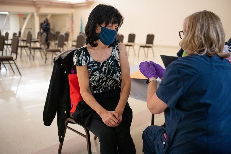 U.S. eyes annual shots as updated COVID vaccines roll out