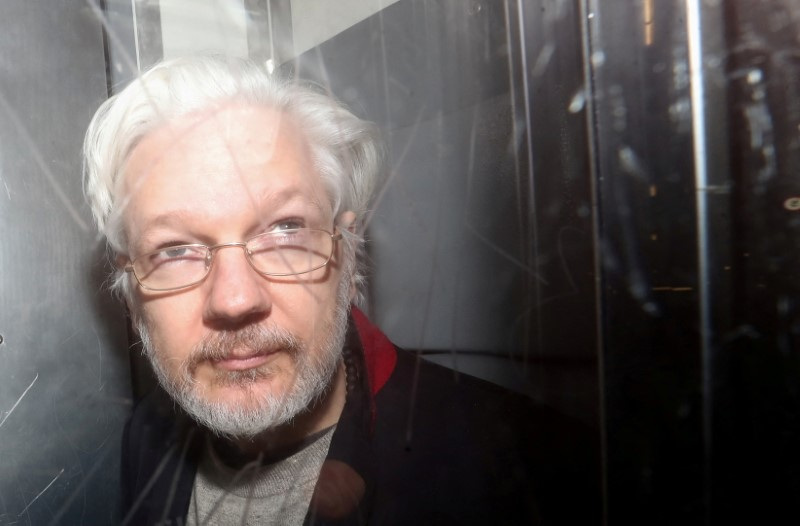 Leading media outlets urge U.S. to end prosecution of Julian Assange