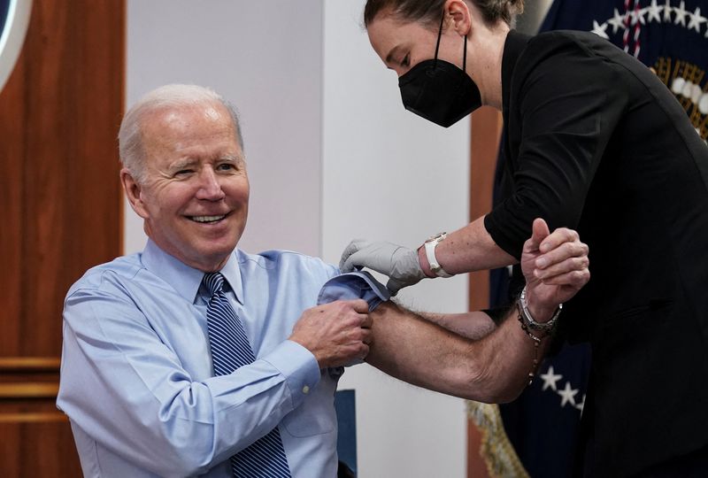 Biden gets second booster shot, pushes for more COVID funding